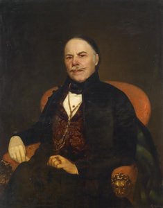 Portret dżentelmena w czerwonym fotelu